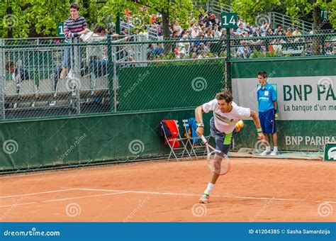 Dusan Lajovic Plays Second Round In Roland Garros 2014 Editorial Image