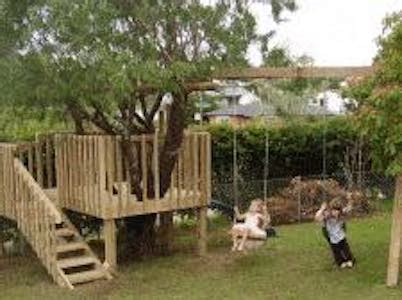 Treehouse with a slide and swing set – Free Woodworking Plan.com