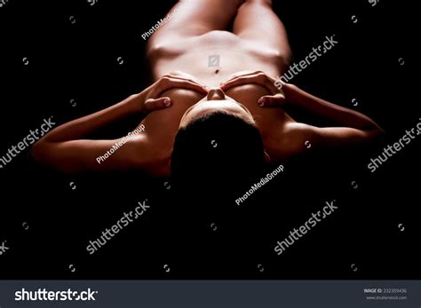 Naked Woman Lying On Dark Floor Stock Photo Shutterstock