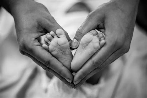 Mother Holding Her Baby Black And White