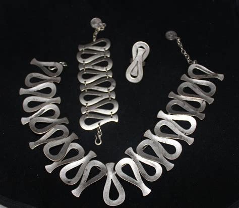 Silver Plated Chunky Set Set Of Necklace Bracelet And Ring Symbol Of