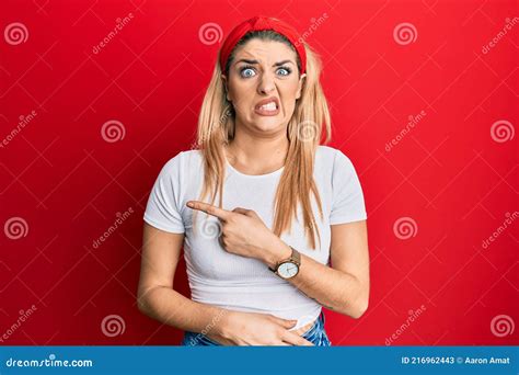 Young Caucasian Woman Wearing Casual White T Shirt Pointing Aside