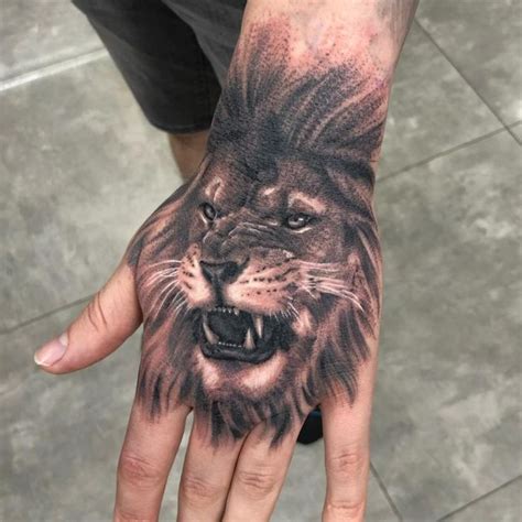 Pin By Igor Orinko On Quick Saves Lion Hand Tattoo Hand Tattoos