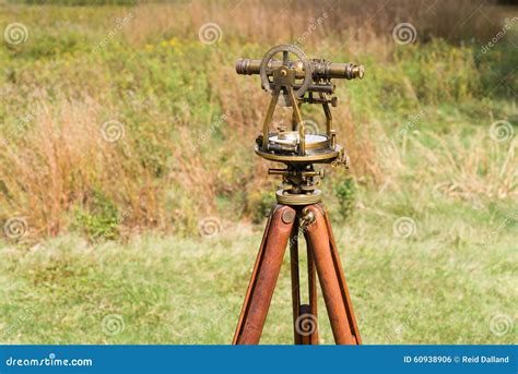 Close Up Of Vintage Surveyors Level Transit Theodolite With Wooden