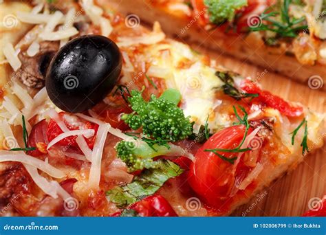 Fresh Pizza With Tomatoes Cheese And Mushrooms On Wooden Table Closeup