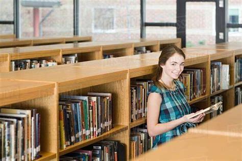 Girl In Library Stock Photo Dissolve