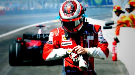 Man In F1 Car Suit And Helmet Formula 1 Scuderia Ferrari Kimi Raikkonen