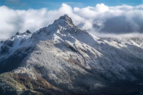 Premium Ai Image Majestic Snow Capped Mountain Peak In Alpine Landscape