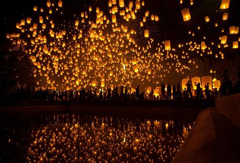 Thousands of lanterns take to the night sky in a lantern festival in Thailand. : pics