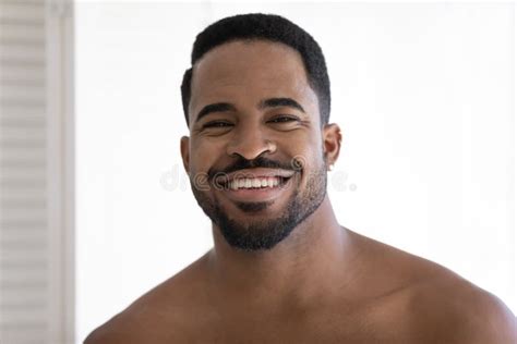 Headshot Portrait of Smiling Biracial Man Posing in Bathroom Stock ...