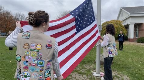 Girl Scouts Raise Flag To Honor Veterans Day In Brockport