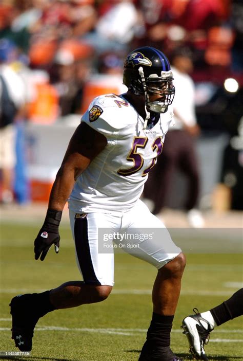 Ray Lewis of the Baltimore Ravens warms up during pregame warm ups ...