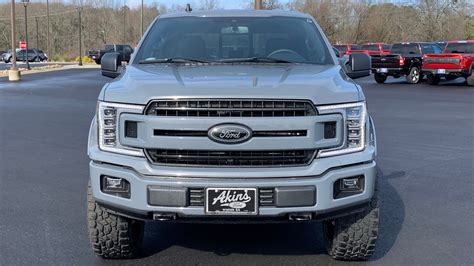 Abyss Gray Ford F 150 Covert Edition Truck Leveled On 34s 22s XLT