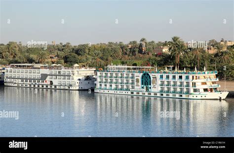 Stationary Nile Cruise Ships At Anchor Near Luxor Egypt Stock Photo