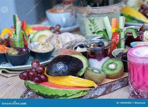 Plates Of Traditional Ethiopian Food With Fruits And Vegetables On A