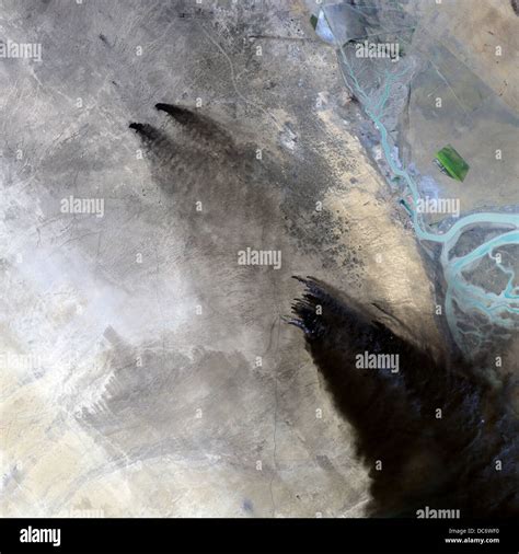 Satellite view of Kuwait oil fires Stock Photo - Alamy