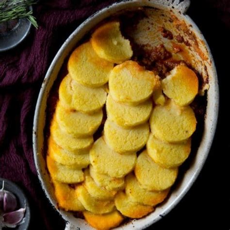 Baked Polenta With Beef And Sausage Ragu Inside The Rustic Kitchen