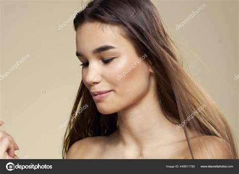 Pretty Woman Naked Shoulders Cosmetics Clean Skin Hair Care Beige Background Stock Photo