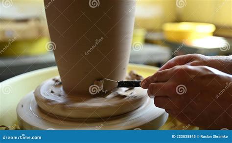 Close Up Shot Of Ceramic Cup Spinning On Potters S Wheel And Hands