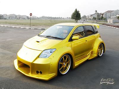 CAR MODIFICATION GALLERY: Toyota Scion Xa with Custom Candy Yellow Paint