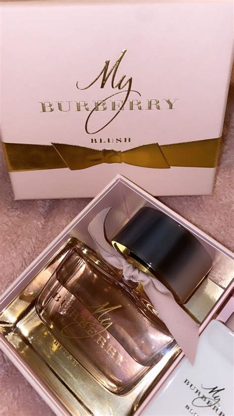 An Open Box With A Perfume In It