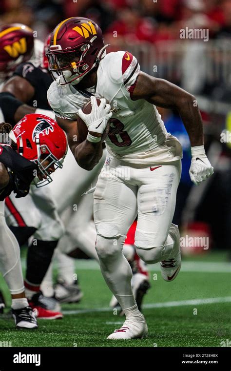 Washington Commanders Running Back Brian Robinson Jr Runs The Ball