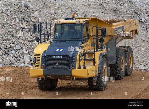 Yellow Articulated Dump Truck Komatsu Hm On Construction Site Stock