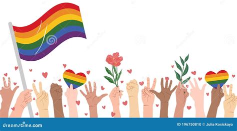 Crowd Of People With Rainbow Flags And Symbols On Pride Paradehands Of