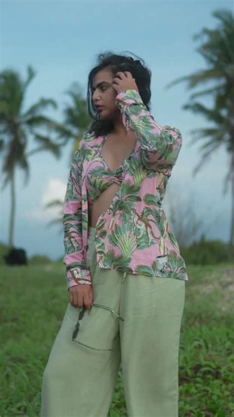 Woman In Tropical Print Bikini Top Poses Stock Video Pond