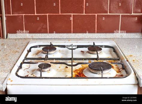 Dirty Stove With Food Leftovers Unclean Gas Kitchen Cooktop With