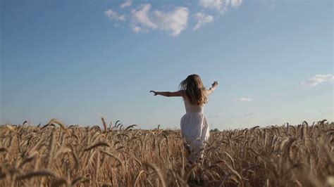 Woman In White Dress Running Through Wheat Stock Footage Sbv