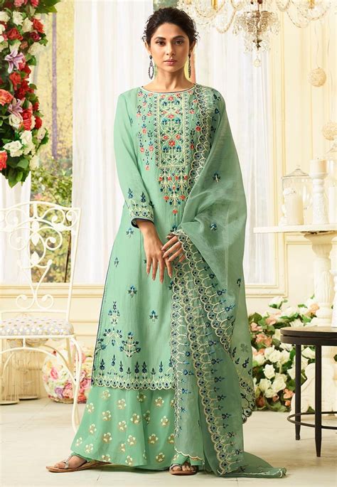 Semi Stitched Art Muslin Silk Pakistani Suit In Pastel Green This Round