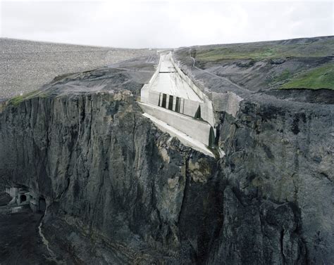 A concrete spillway chute of the Kárahnjúkar dam Nordic lights