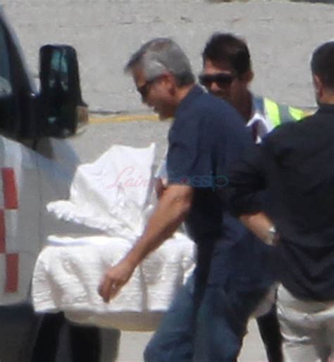 George and Amal Clooney arrive in Milan with newborn twins