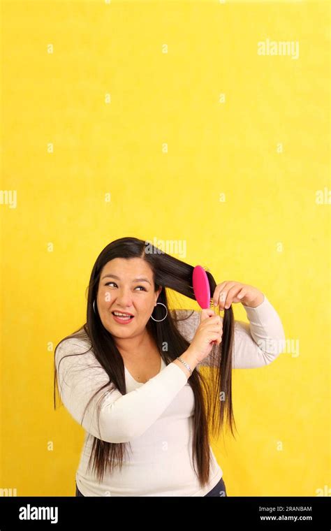Adult Year Old Latina Woman Brushes Her Hair With Difficulty Because It Is Very Tangled Due