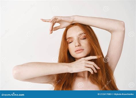 Beauty Close Up Of Tender Redhead Female Model With Long Red Natural