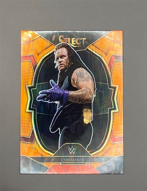 2023 Panini Select WWE Undertaker 71 Orange Flash Prizm Concourse C4