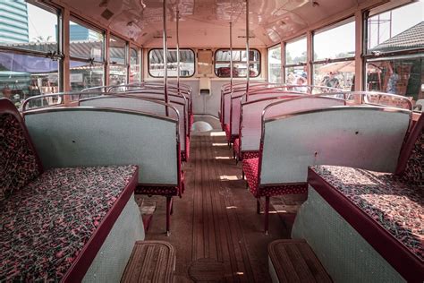 Seats and Handrails Inside a Public Bus · Free Stock Photo