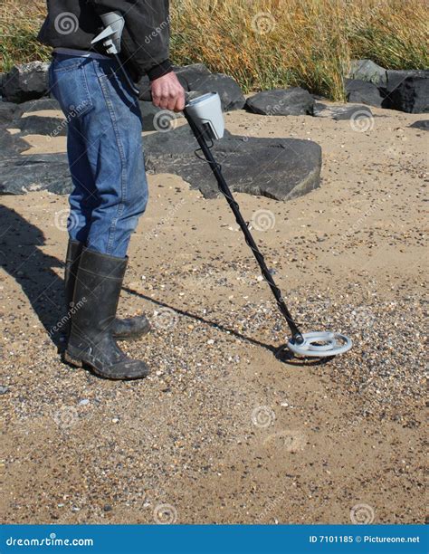 Person Using Metal Detector Stock Image Image Of Exploring