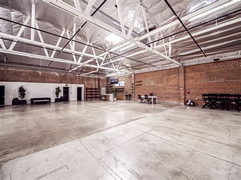 Polished Brick Warehouse Space with Cyclorama Wall | Rent this location on Giggster