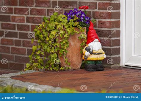 Cute Garden Gnome at the Entrance To the House. Garden Decorations ...