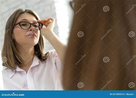 Woman With Poor Eyesight A Beautiful Girl Wears Glasses To Improve Her