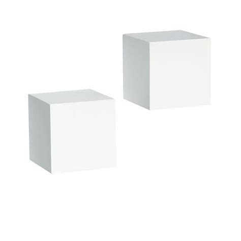 Two White Cubes Sitting Next To Each Other