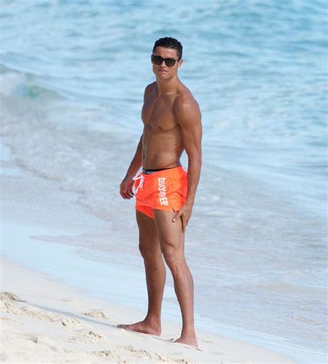 Cristiano Ronaldo Flaunts Insanely Buff Bod With Son On Beach