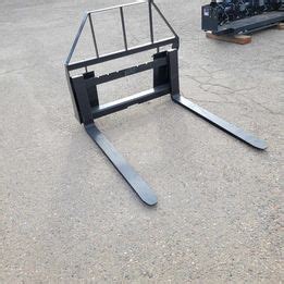 Adjustable Skid Steer Forks – $700.00 – Western Mfg. Corp.