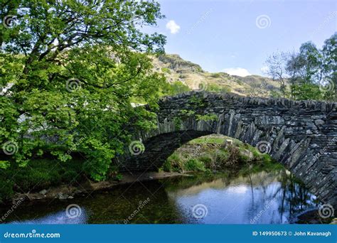 Stone Built Arch Bridge Over Stream In Langdale In English Lake