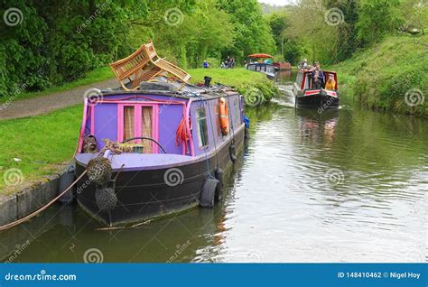 Canal Narrowboat Cruising Past Moored Boat Editorial Photography