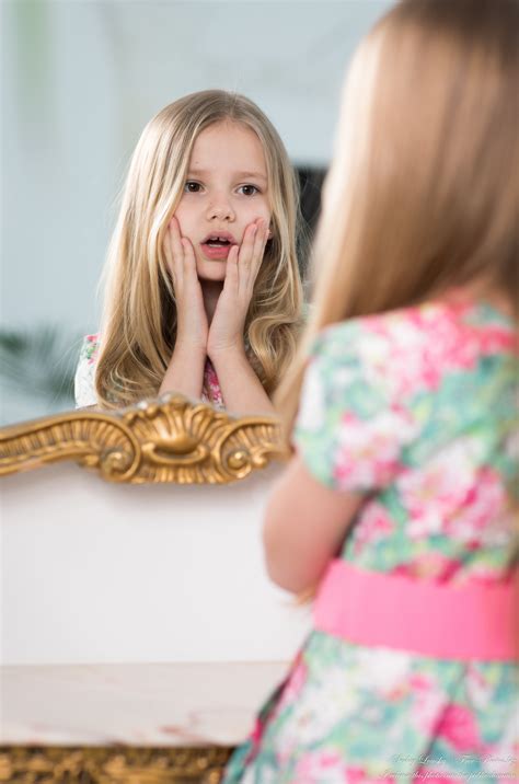Photo of Ania - a 9-year-old girl with natural fair hair photographed