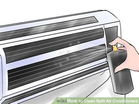 A Toaster Oven Being Cleaned With A Spray Bottle