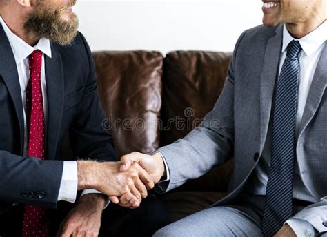 Two Businessmen Agreeing On A Deal Stock Image Image Of Joyful